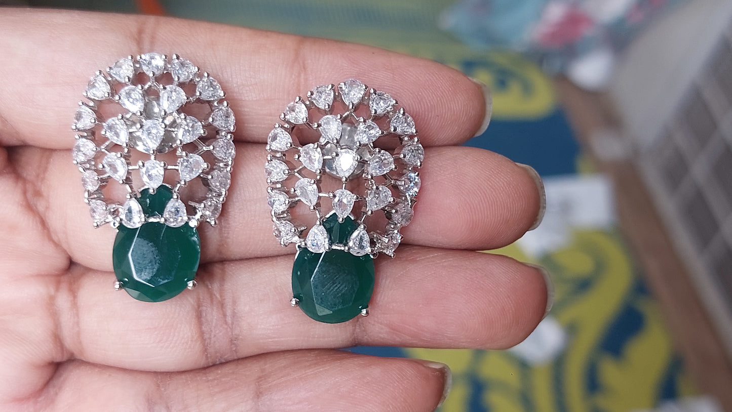 Floral design studs in green and white stones