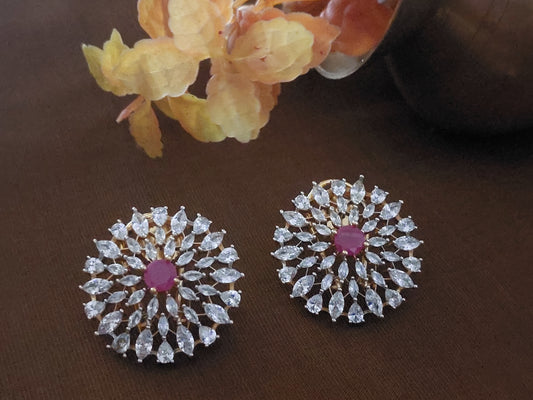 Floral design studs in red and white stones