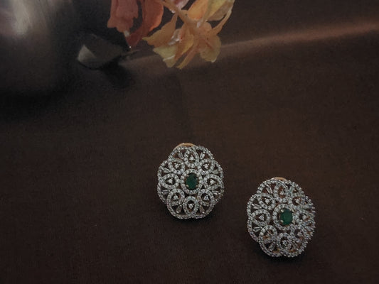 Floral design studs in green and white stones